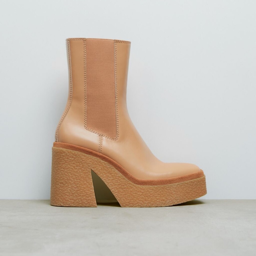 Heeled leather crepe pull on boot